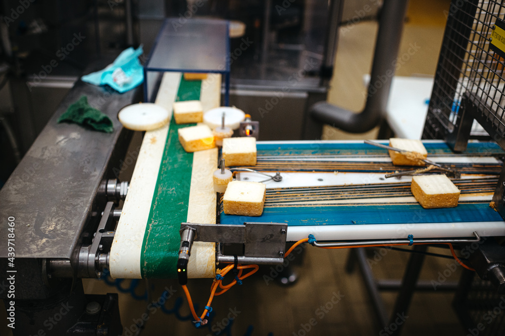 Industrial cutting and packing of cheese Industrial cutting and packing of cheese