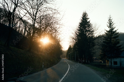 lonely road at sunset moment photo