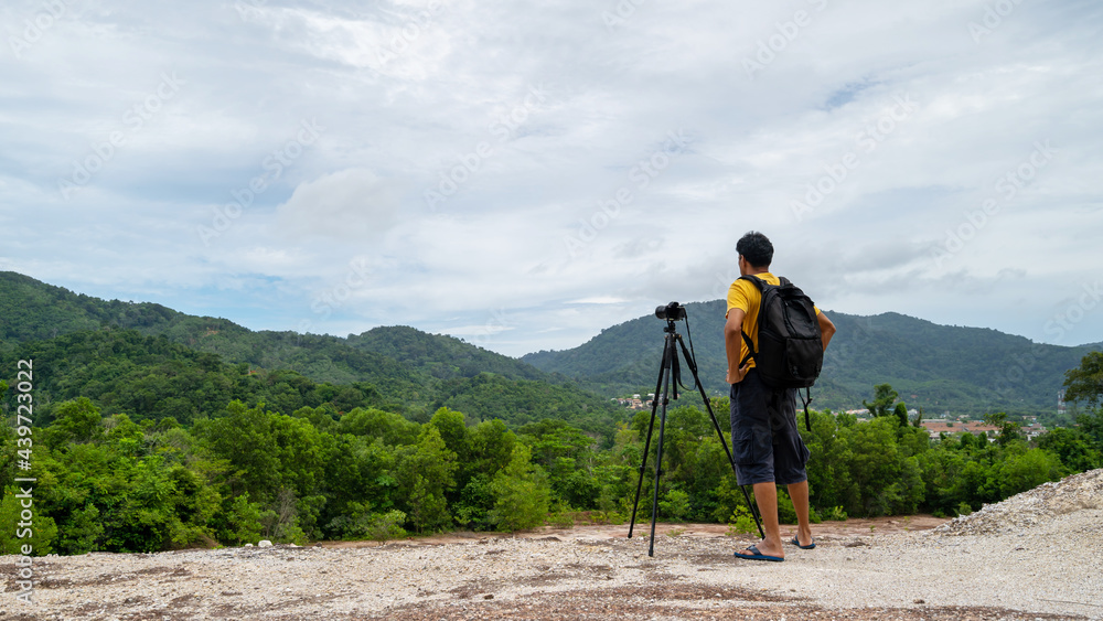 Professional man Photography on high mountain take a picture Landscape nature view at Phuket Thailand