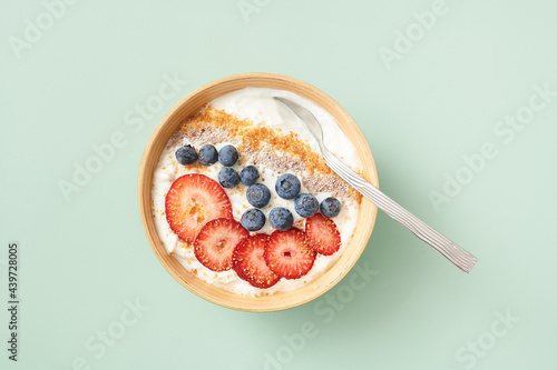 Single Bowl of Yogurt and Fruit From Above photo