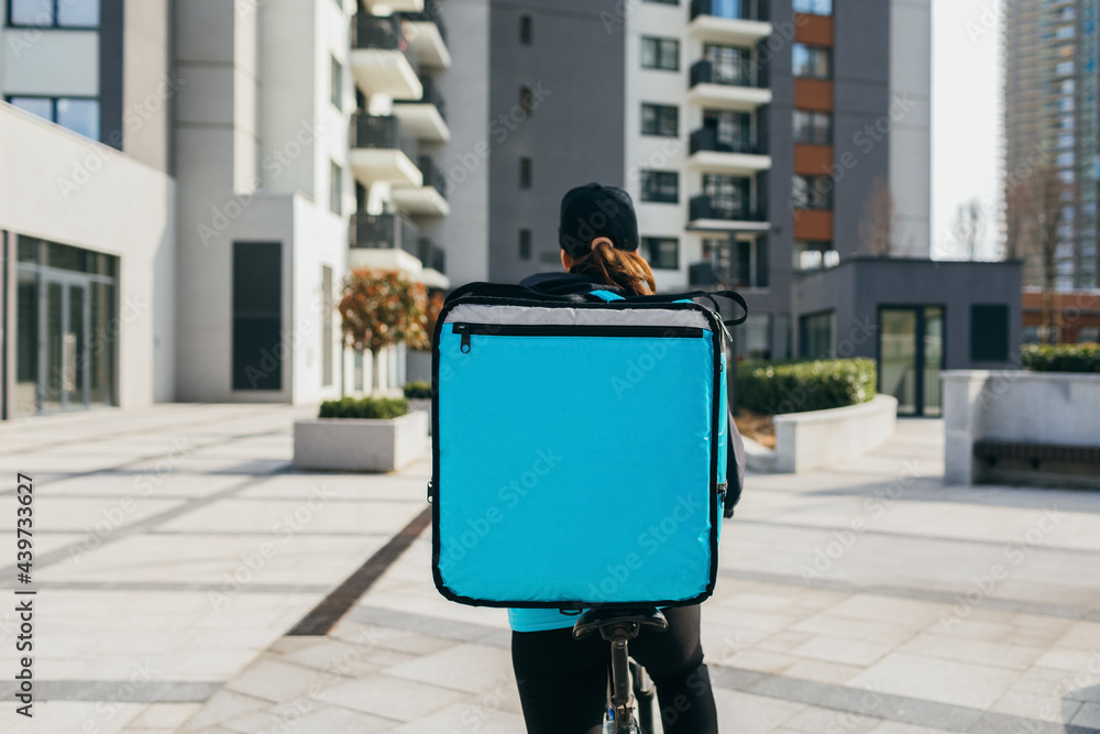 Delivery Woman Riding Bicycle 