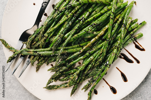 Asparagus drizzled with balsamic reduction photo