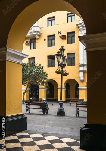 Santa Rosa passage in the historic center of Lima   path with colonial yellow buildings