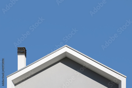 pitched roof with chimney photo