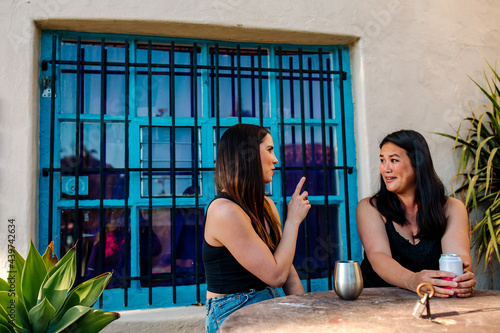 Deaf friends using sign language photo