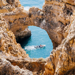 Boat on the rocky coast