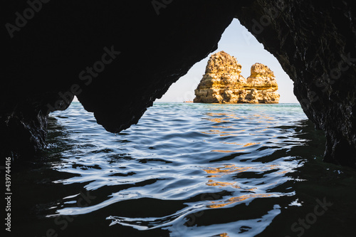 Rock outside of the cave at the sea coast