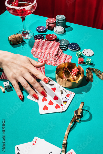 stylish female hands at poker table