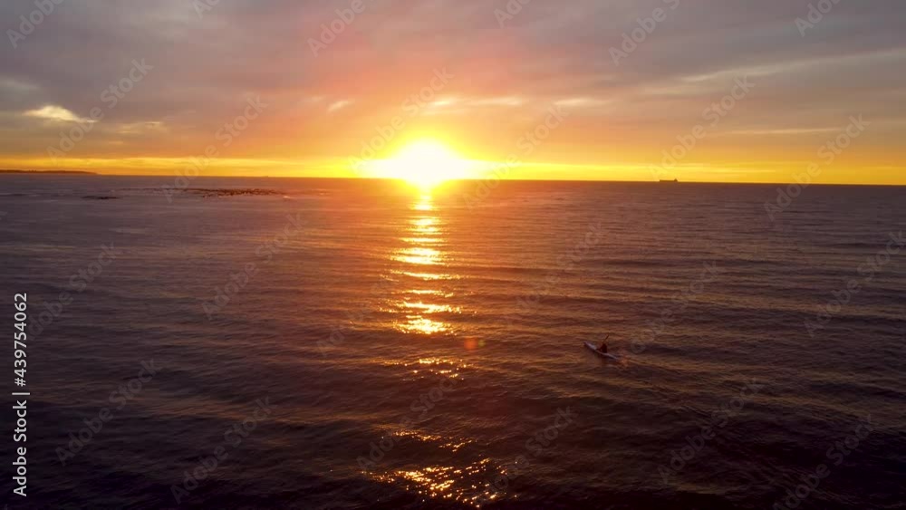 Drone sunrise view of person in kayak in morning paddling in Shelly Beach Pacific Ocean Central Coast NSW Australia 3840x2160 4K Drone sunrise view of person in kayak in morning paddling in Shelly Beach Pacific Ocean Central Coast NSW Australia 3840x2160 4K