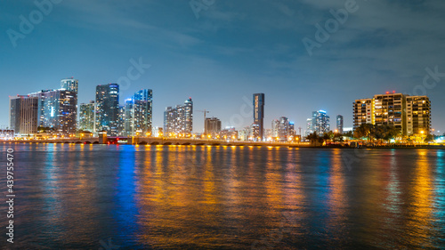 Miami city. Miami skyline panorama at dusk with skyscrapers over sea. Night downtown sanset. © Volodymyr