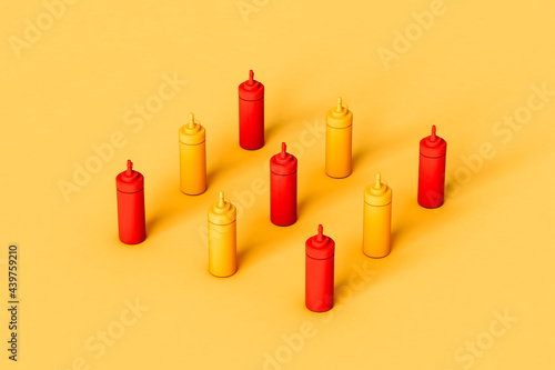 organized Sauce dispencer on yellow background  photo