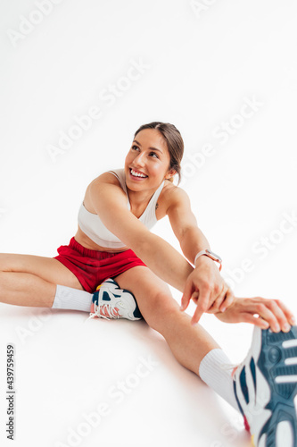 Sportswoman Exercising in Studio photo