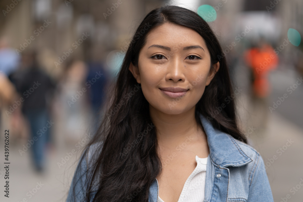 Young Asian woman in city smile happy face portrait Young Asian woman in city smile happy face portrait