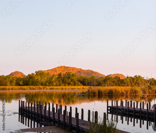 jetties at Lily Creek Lagoon in Kununurra at sunset photo