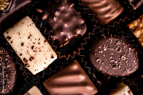 Swiss chocolates in gift box, various luxury pralines made of dark and milk organic chocolate in chocolaterie in Switzerland, sweet dessert food as holiday present and premium confectionery brand.