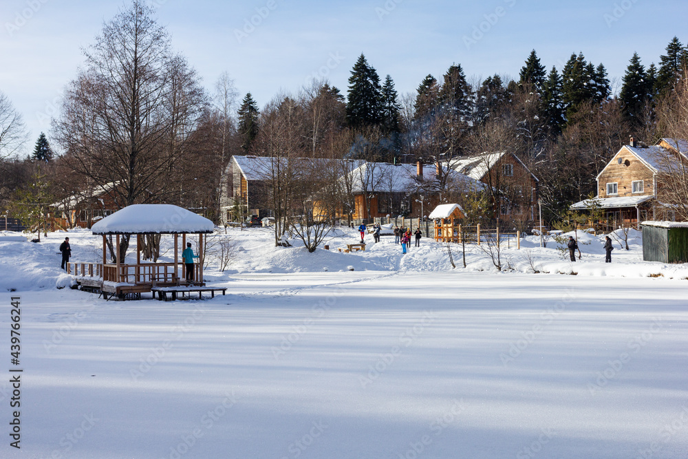 Winter season, snow-covered recreation center in the snow captivity of nature, early frosty morning with sparkling snow.