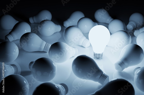 Light bulb bright outstanding among lightbulb on white background. Concept of creative idea and inspire innovation, Unique, Think different, Individual and standing out from the crowd. 3d illustration