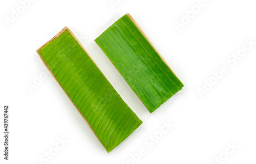 Eco tray which made from banana leaf and banana tree, top view image, the isolated image on white background. The concept for organic vegetable or others products.
