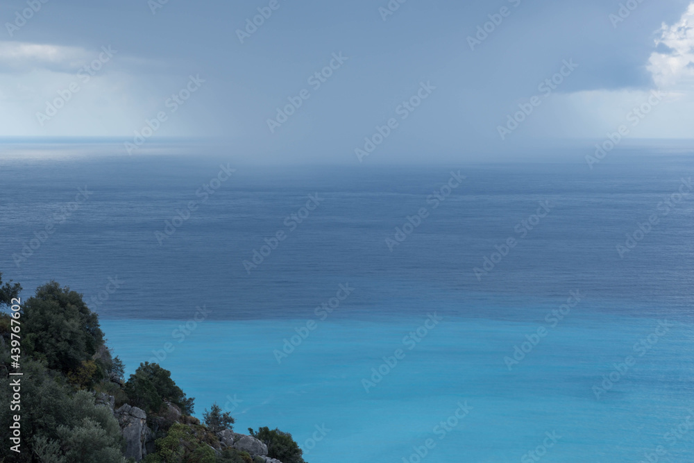 The sea recedes into the distance, to the horizon. The sea recedes into the distance, to the horizon.