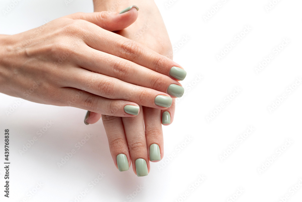 Beautiful womans hands with summer nail. Fresh manicure isolated on white background Beautiful womans hands with summer nail. Fresh manicure isolated on white background