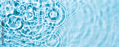 Abstract transparent liquid banner with concentric circles and ripples. Spa concept. Soft focus