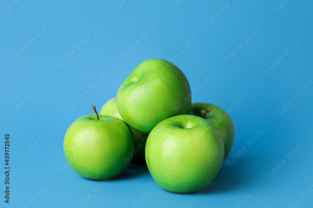Fresh green apples on color background Fresh green apples on color background
