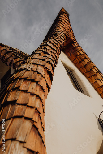 Vertical shot of the roof of Castelul de Lut Valea Zanelor landmark in Porumbacu de Sus, Romaniaa photo