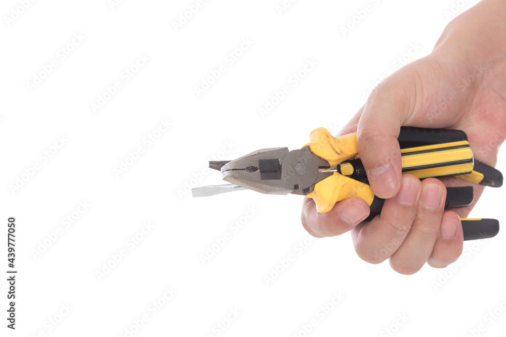 Closeup of hands holding tools in front of white background Closeup of hands holding tools in front of white background