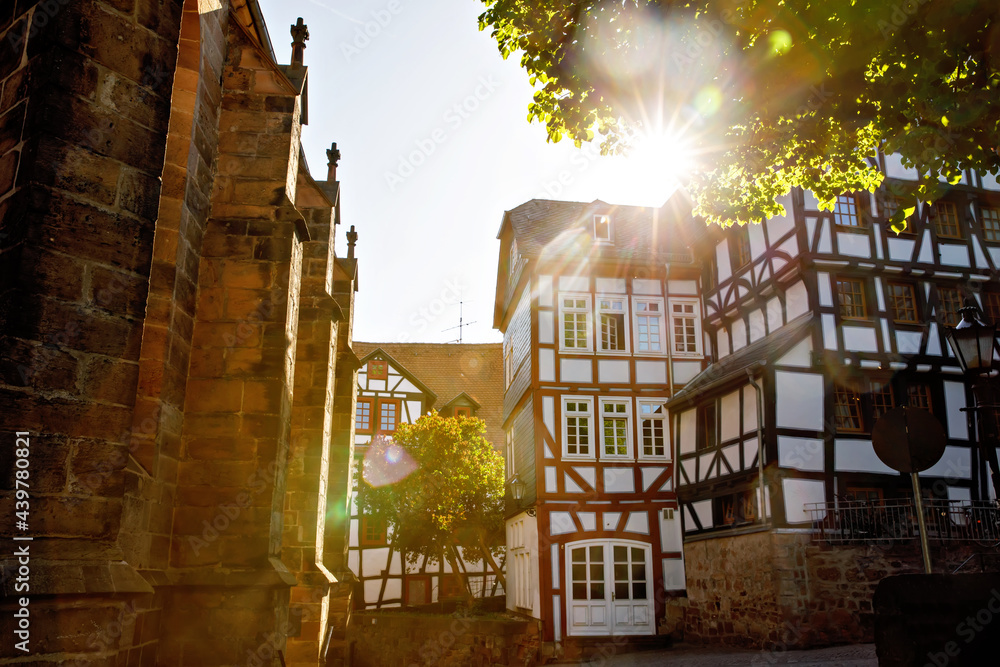 Cityscape of the German city of Marburg with historical townhall and market place. Details of