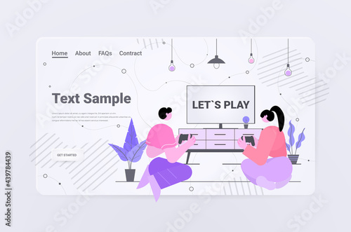 couple having fun playing video games using wireless gamepads controllers game e-sports leisure gaming industry