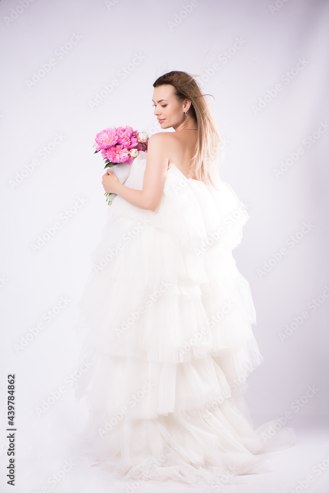 Beautiful woman fashion model makeup with blossom peonies. Beautiful woman fashion model makeup with blossom peonies.