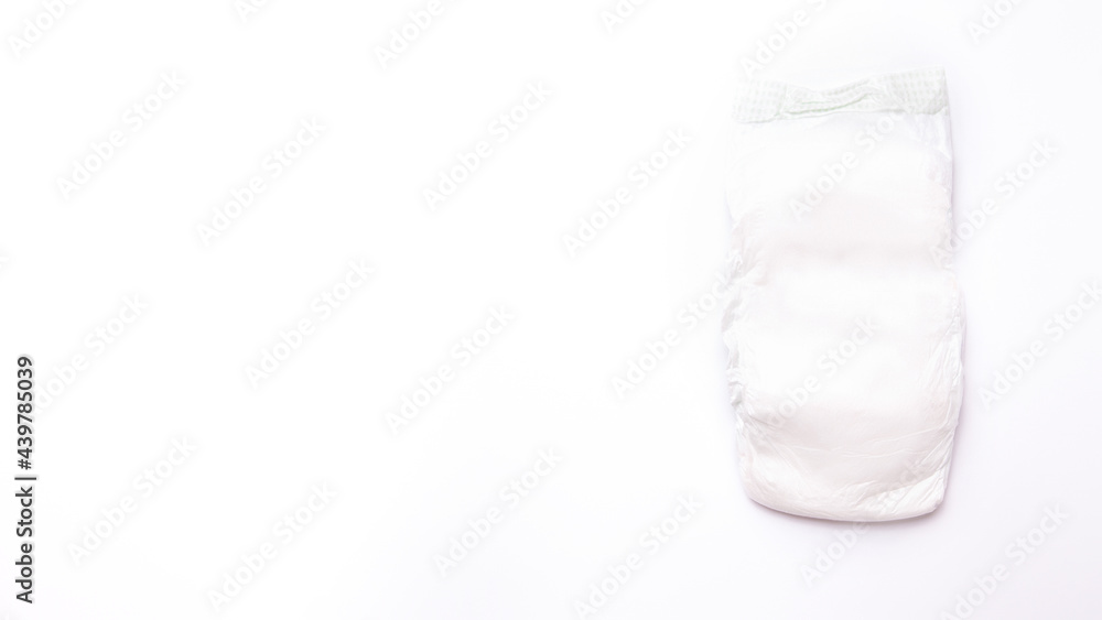 Baby diapers on white background. Space for text Baby diapers on white background. Space for text