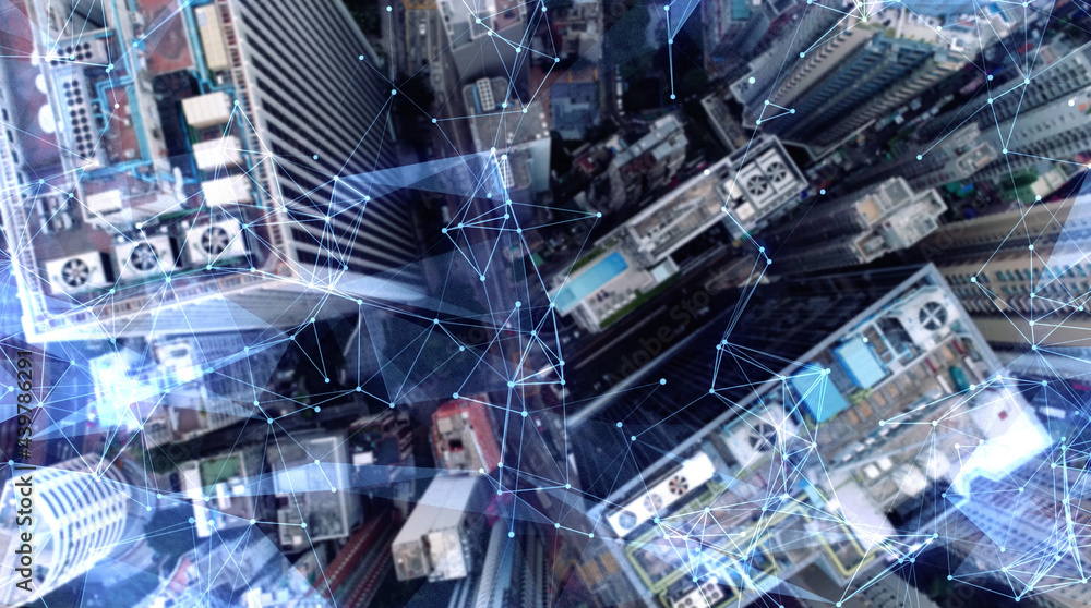 Aerial. Camera moving around buildings. Wireless communication network concept. IoT Internet of Things. ICTInformation Communication Technology. Aerial. Camera moving around buildings. Wireless communication network concept. IoT Internet of Things. ICTInformation Communication Technology.