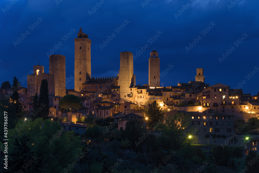 Medieval town of San Gimignano on September evening. Italy
