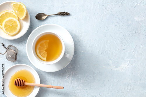 Lemon tea with honey banner, overhead flat lay shot with copy space. Healthy organic citrus detox beverage