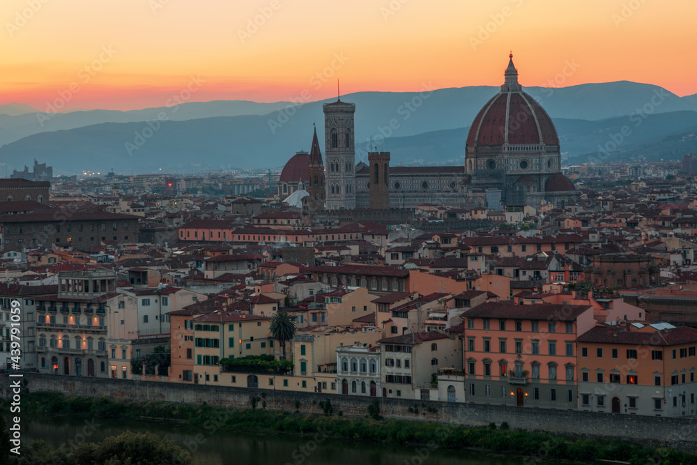 Florence, Italy - 20 June, 2019 : twilight view of Cathedral of Santa Maria del Fiore, known for its red-tiled dome, view from Piazzale Michelangelo.