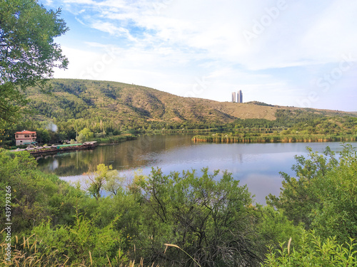 house lake view with trees around