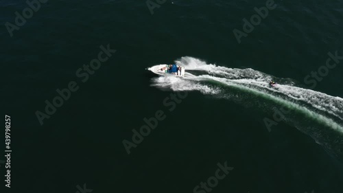 Wallpaper Mural A large boat tows on a rope towed tubes top view. Riding towed tubes aerial view. Entertainment on the water top view. Torontodigital.ca