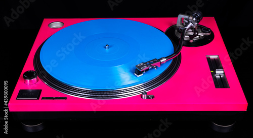 Pink DJ turntable player with with blue vinyl