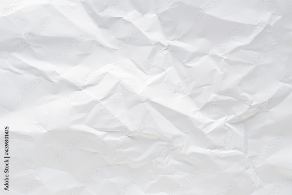 Obraz premium White crumpled paper texture background.