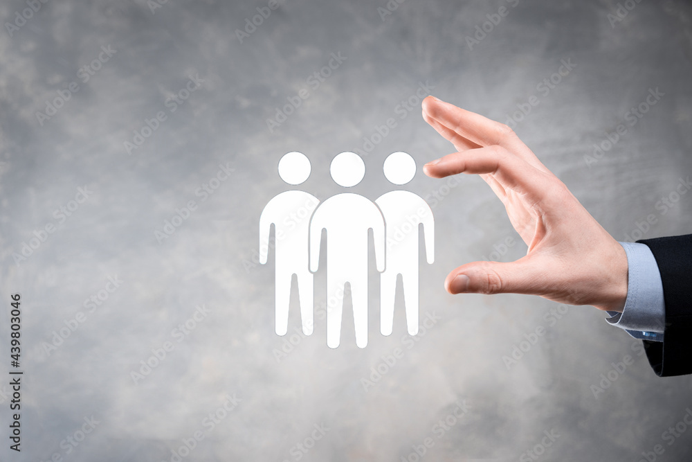 Businessman hold teamwork icon. Building a strong team. people icon. Human resources and management concept. social networking, assessment center concept, personal audit or CRM concept. Businessman hold teamwork icon. Building a strong team. people icon. Human resources and management concept. social networking, assessment center concept, personal audit or CRM concept.