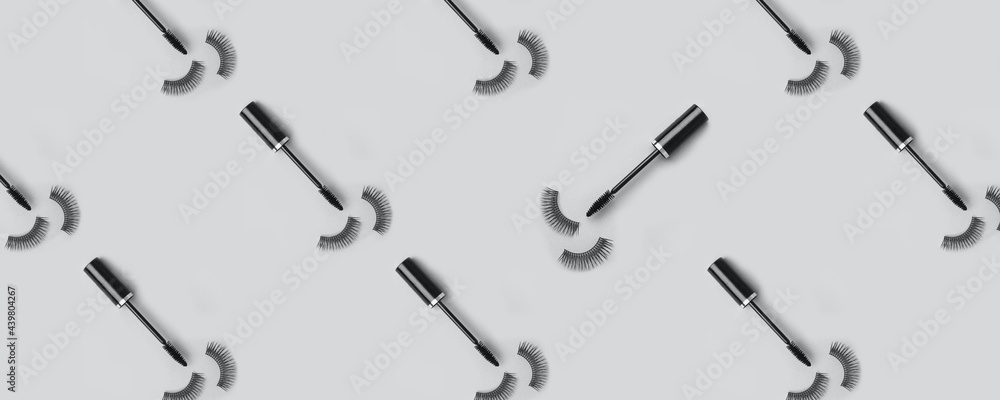 Set for eye lash extension on trendy gray background. Fake eyelashes, mascara brush, Beauty stylish seamless pattern concept, makeup cosmetics. Banner for site, header Set for eye lash extension on trendy gray background. Fake eyelashes, mascara brush, Beauty stylish seamless pattern concept, makeup cosmetics. Banner for site, header