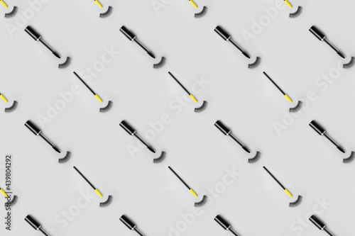 Wallpaper Mural Set for eye lash extension on trendy gray background. Fake eyelashes, mascara brush, Beauty stylish seamless pattern concept, makeup cosmetics. Banner for site, header Torontodigital.ca