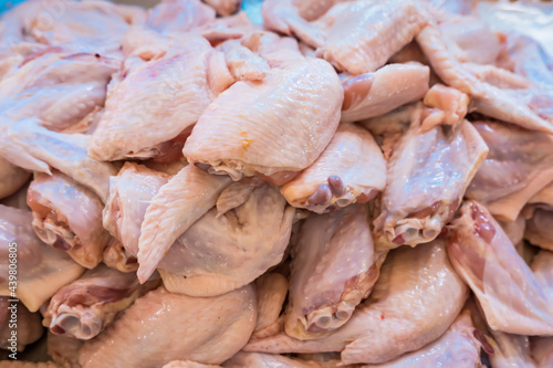 Raw chicken wings in the market