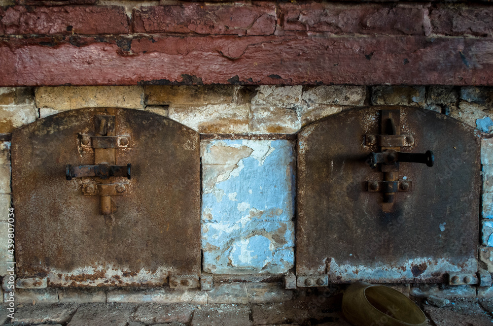 
old oven, for cooking, standing indoors