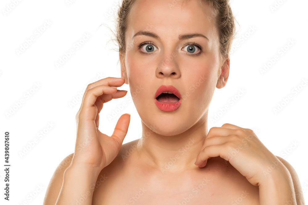 portrait of a young surprised and shocked blonde portrait of a young surprised and shocked blonde