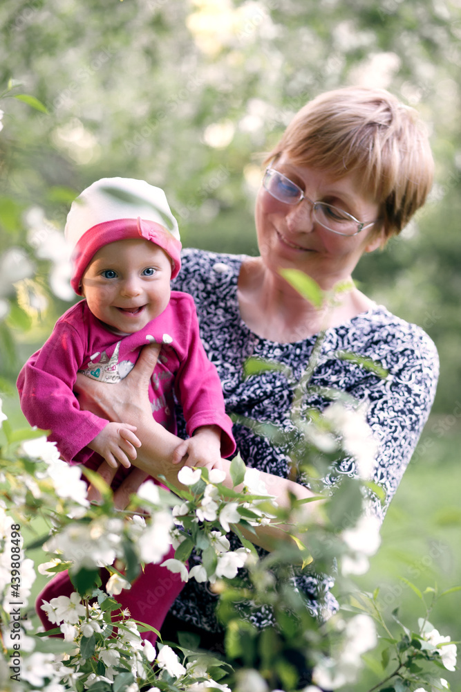 Happy family. Grandmother and granddaughter child. Loving older grandmother and adorable granddaughter. Enjoying tender moment, embracing, two generations. Happy family. Grandmother and granddaughter child. Loving older grandmother and adorable granddaughter. Enjoying tender moment, embracing, two generations.