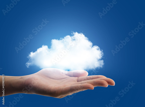 Hand offer the cloud for computing concept with copy space. 