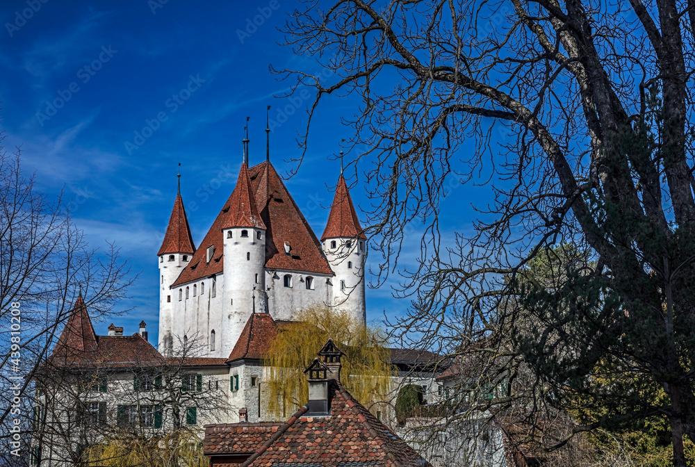 Castle towers above the roofs of the old city of Thun, Switzerland Castle towers above the roofs of the old city of Thun, Switzerland