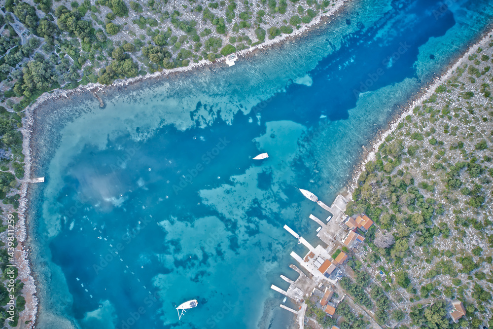 Aerial bird's eye view of bay with yachts and small marina in Croatia, Europe